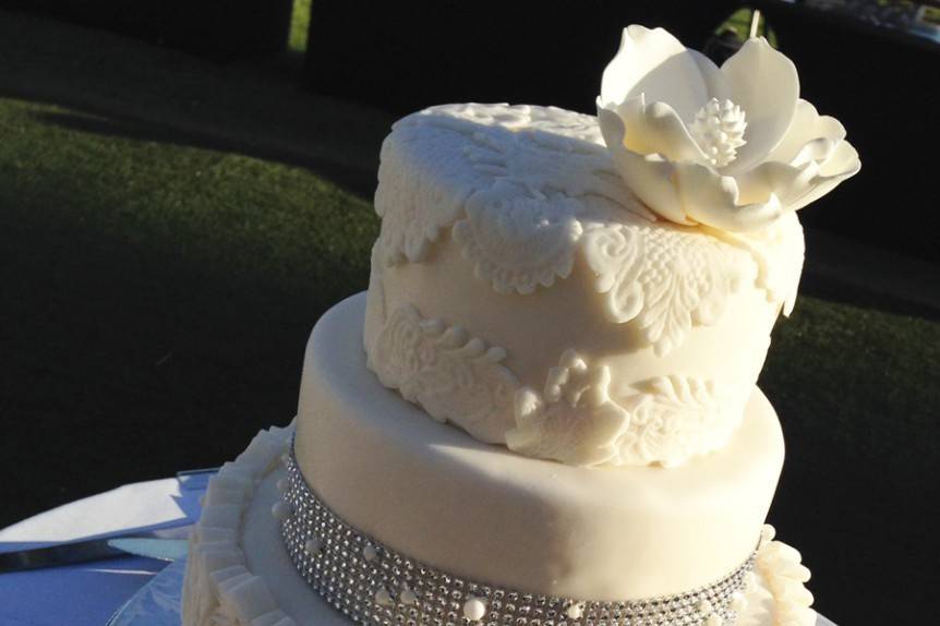 Three tier floral wedding cake