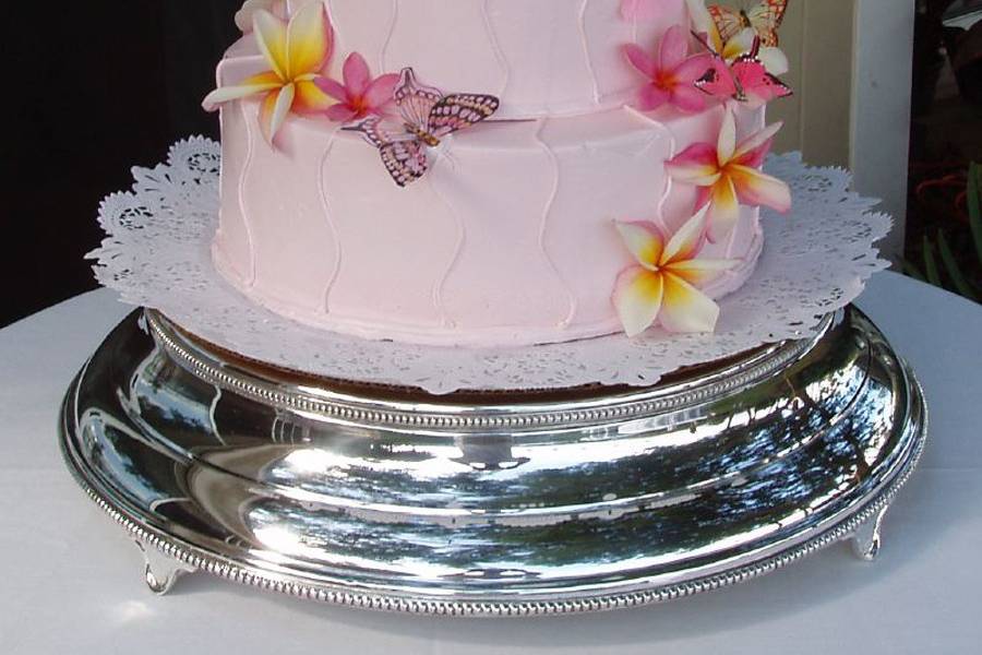 Three tier pink cake with edible kalachuchis