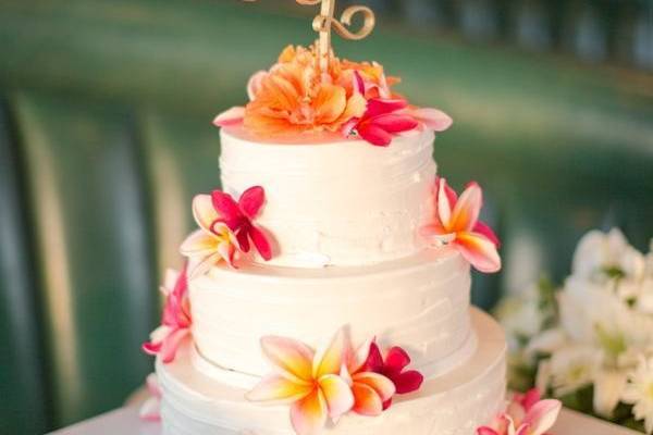 Three tier wedding cake with flowers