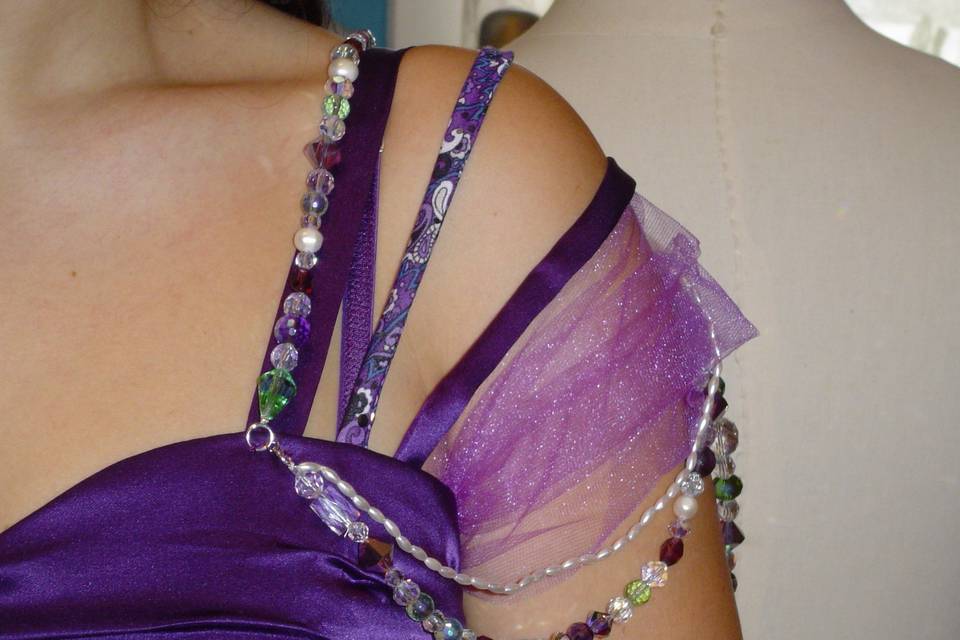 This is a detail of the beading, ribbons, tulle and straps that made up the suggestion of a sleeve.
