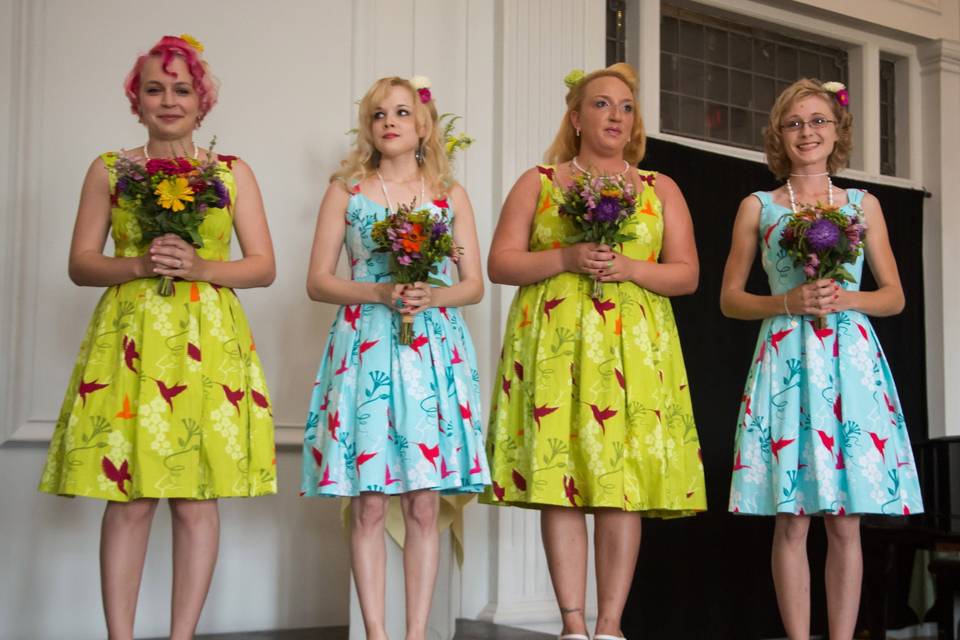 Here are the bridesmaids in cotton print dresses with pleated skirts. Dresses that can truly be worn again.