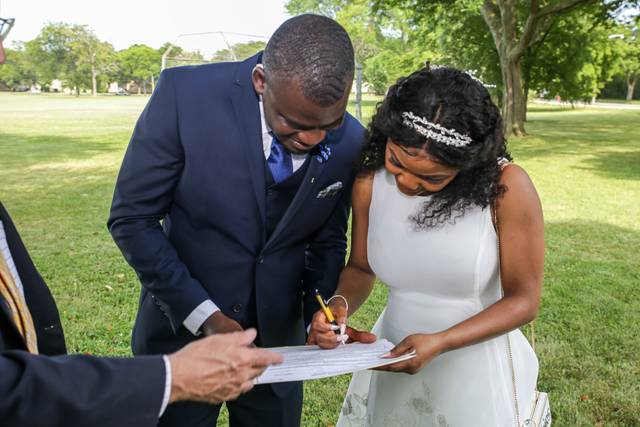 The newly wed signing