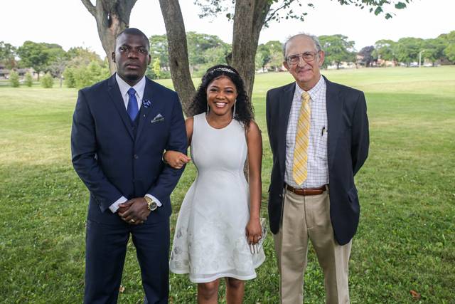 Newly wed and officiant