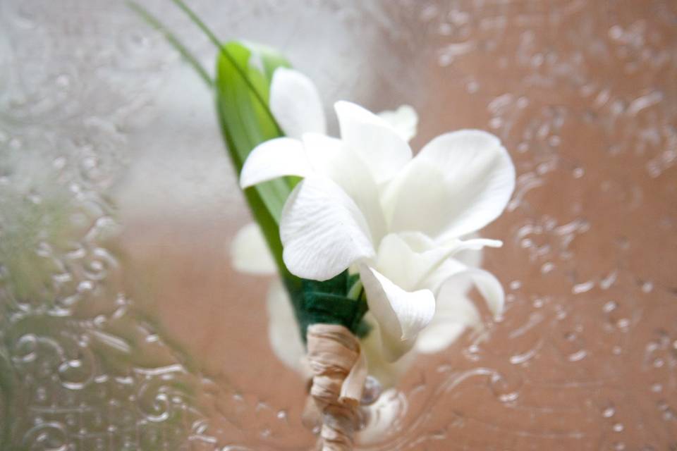White orchid boutonniere