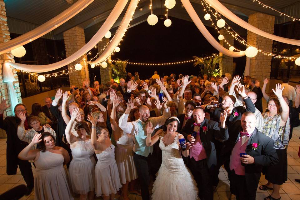 Sheer ceiling design and dancing guests