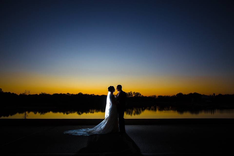 Dramatic shot of couple as the sun sets