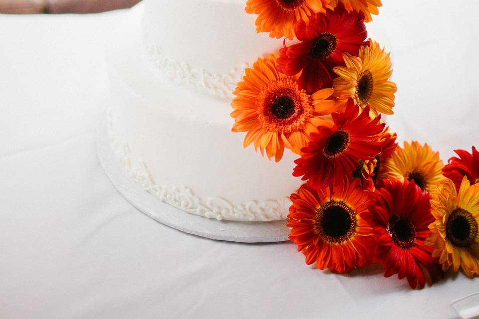 White wedding cake with flowers