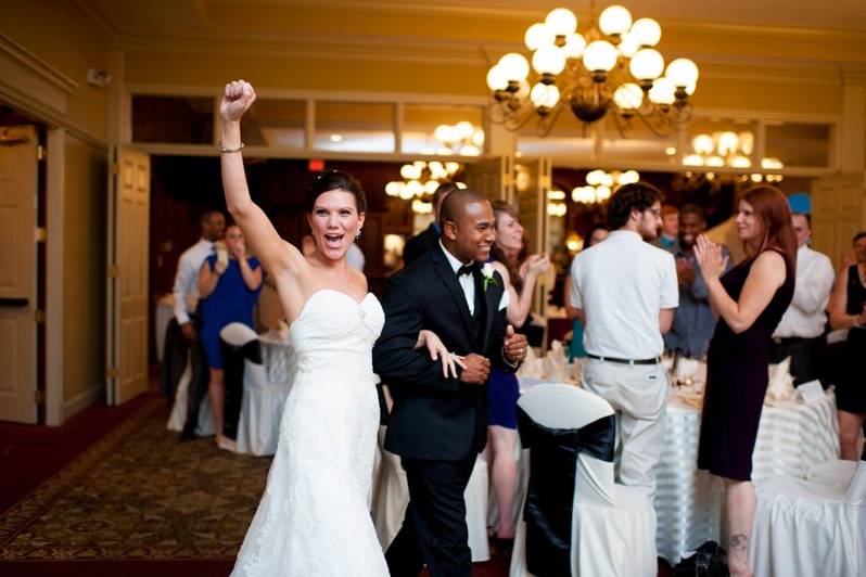 Newlyweds dancing with their guests