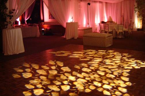 Decorative dancefloor lighting. Custom aspen leaf gobos are very popular for mountain weddings