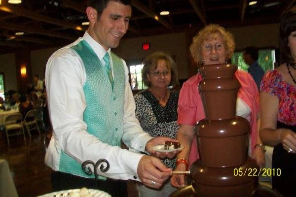 Guests enjoying flowing milk chocolate