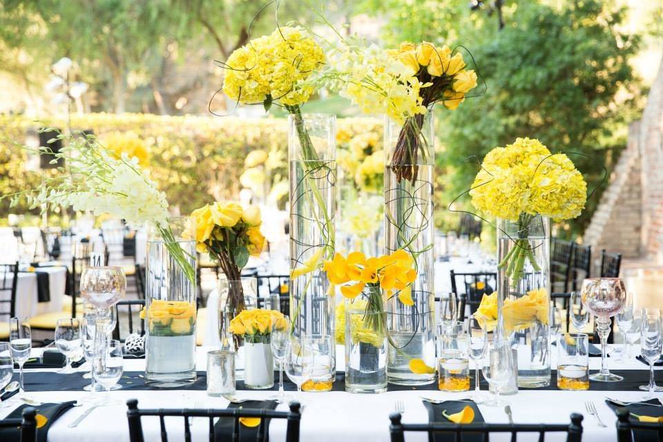 Beautiful outdoor wedding inspired by yellow and black and white theme
