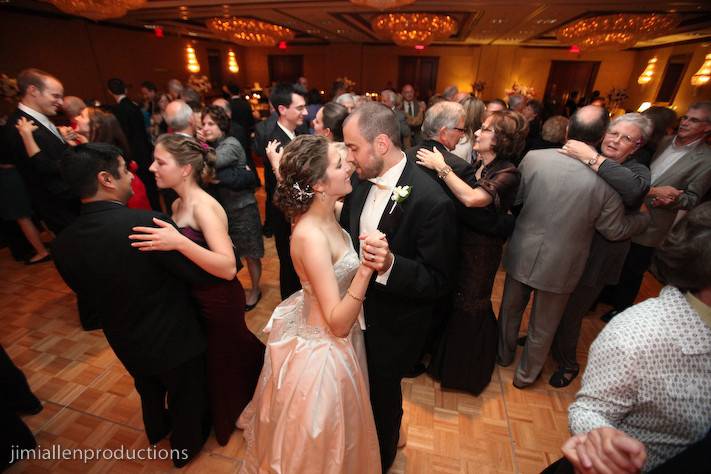 Couple and guests dancing