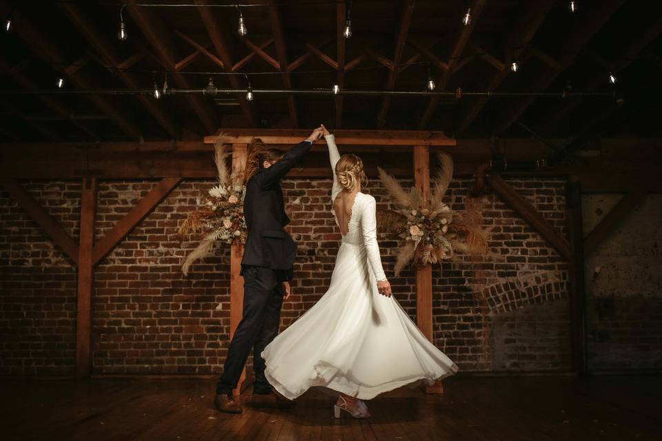Dancing in front of arch