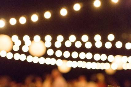 Mason jars filled with candles or Queen Anne's Lace adorned the wine barrel cocktail tables.