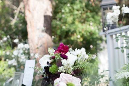 The black sugar coated cutting cake was carrot made by a family friend and adorned with flowers.