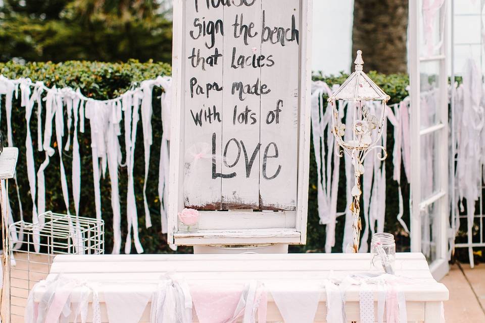 'Guest Book' was a bench made by the Grandfather of the Bride, guests were asked to sign.