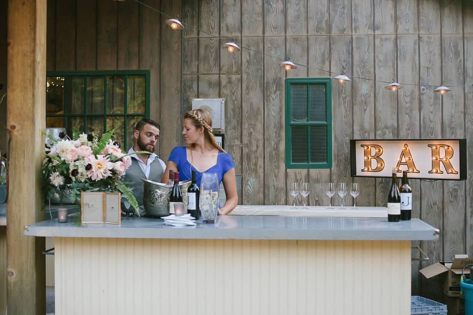 The McCoy Tyler Band played their American Folk style music on a built in stage with a giant heart marquee built by the Bride's Father.