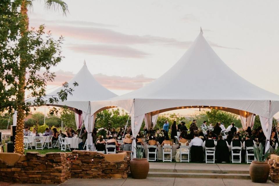 Tent wedding ceremony with seating for 60