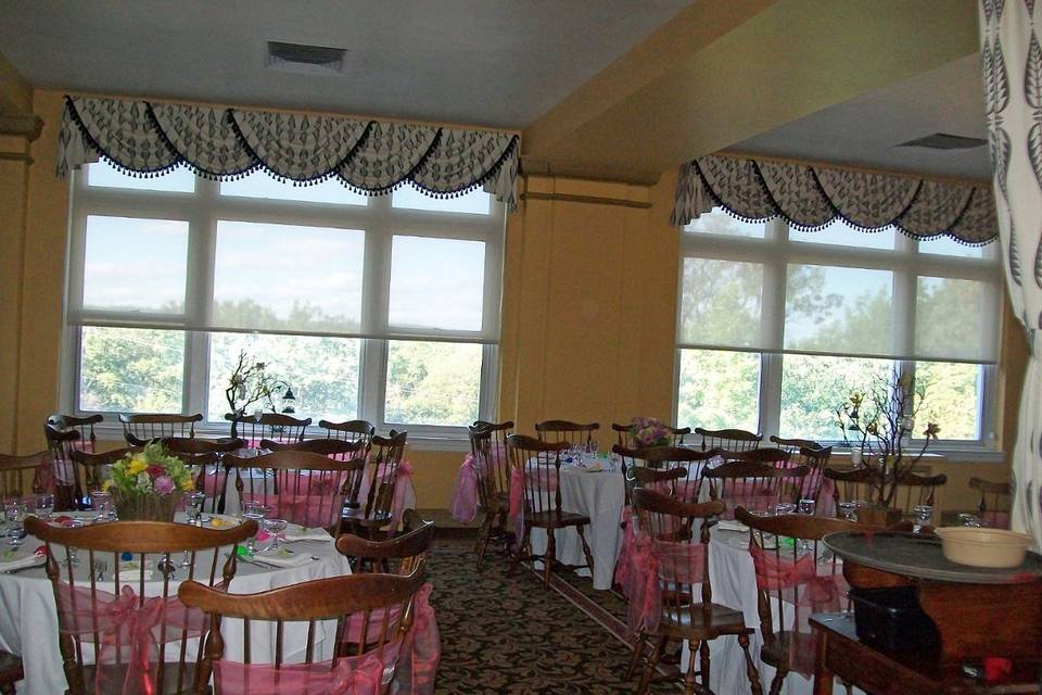 Three styles of centerpieces were used: Manzanita Trees with orchids and hanging candles (rentals), round twig baskets, and rectangular willow baskets with Manzanita accents.