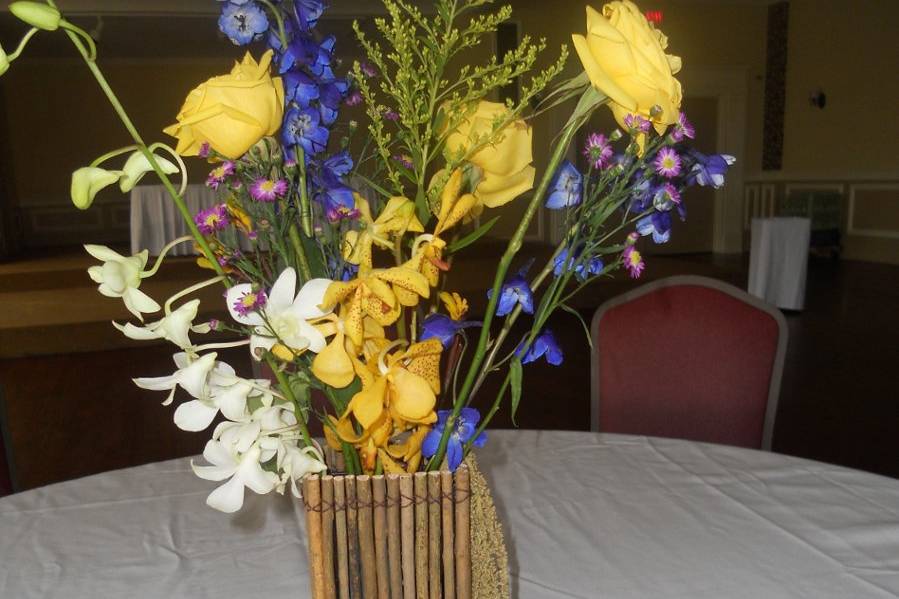 A tall willow basket was used to hold blues, yellows and whites.