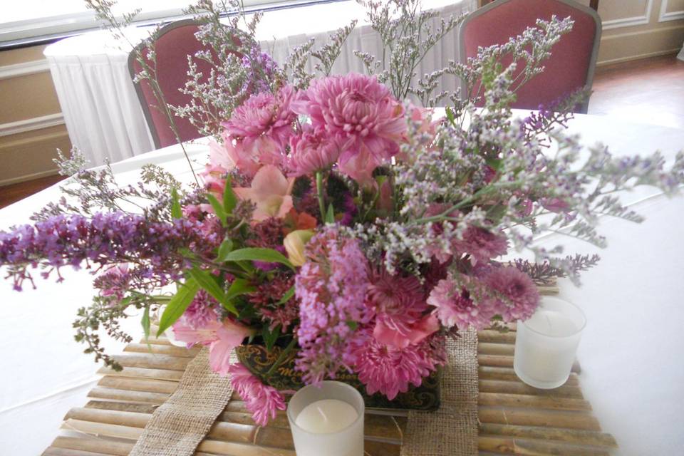 Shades of pinks and lavenders in an antique cookie tin...