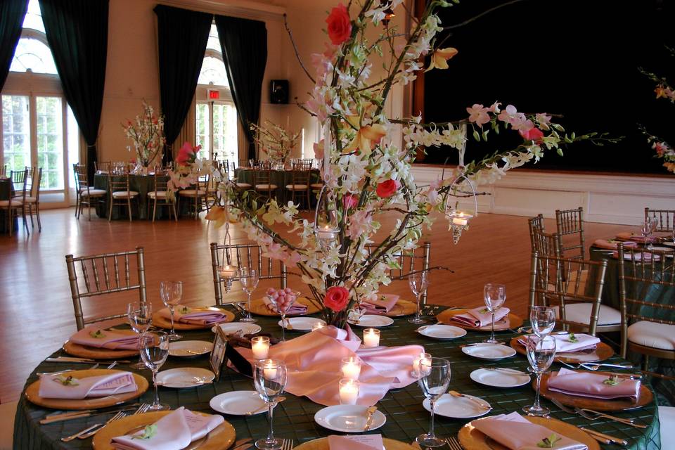 Table setting with floral and candle centerpiece