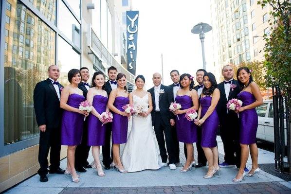 The couple with the bridesmaids and groomsmen