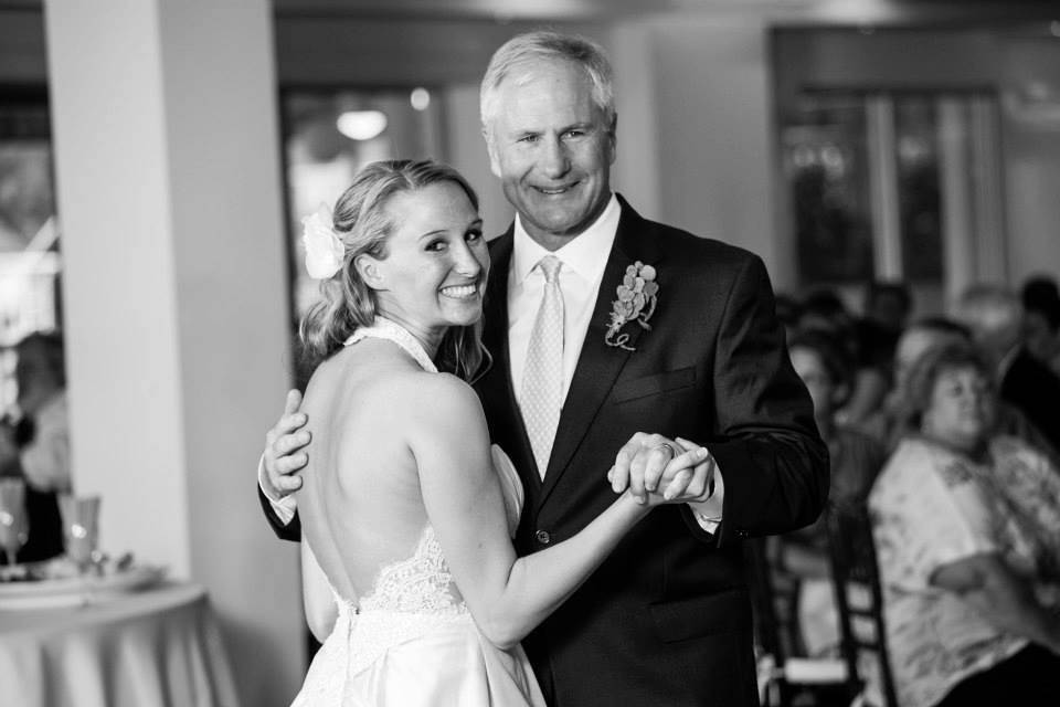 The bride and her father dancing