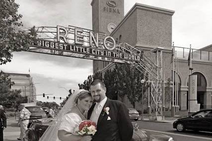 Bride and groom in their wedding car