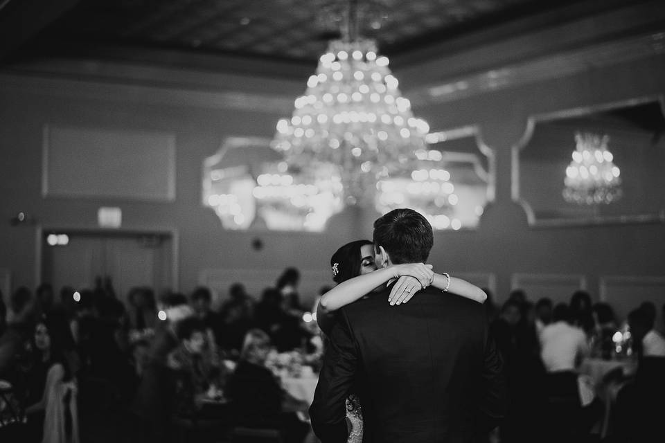 A kiss under the chandeliers