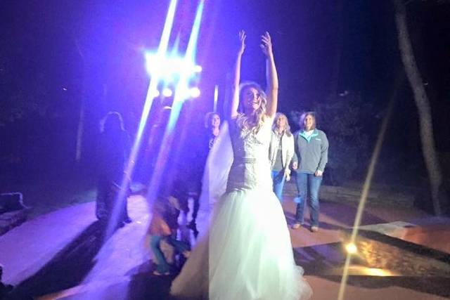 The bride tossing her bouquet