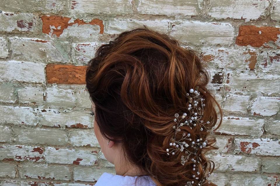 Braided hair with baby's breath flowers