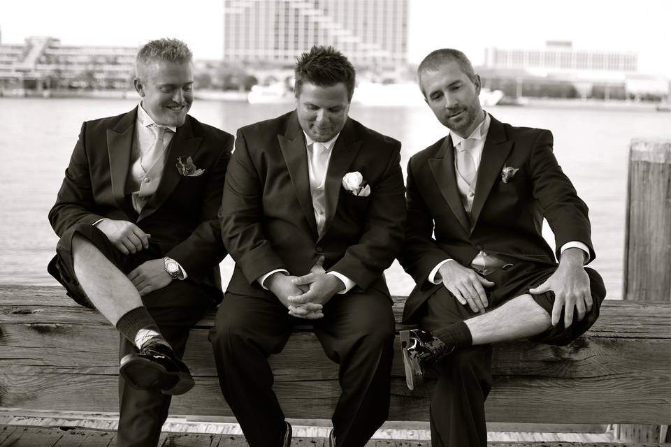 Groom Chris with his mates acting the goat down by the waterside on the St. John's river.