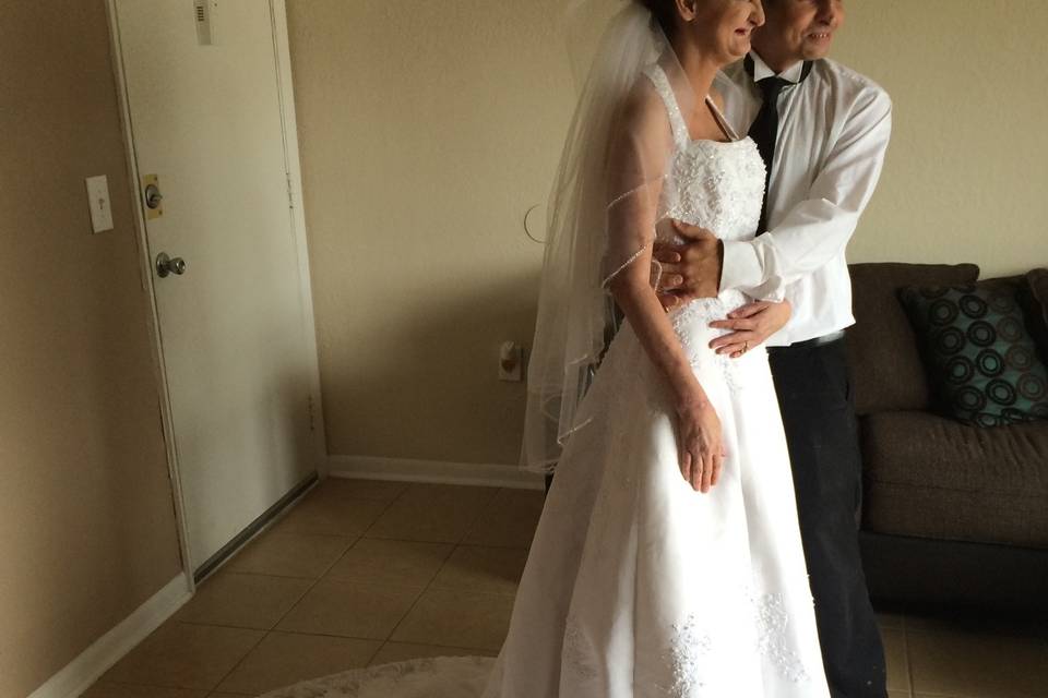 The fantastically gorgeous bride, Lindsay and her adorable groom, Chris as I marry them overlooking the St. Johns River high atop in the University Club of Jacksonville.