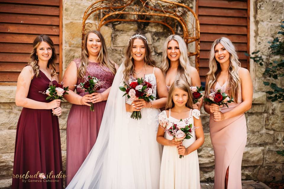 The bridesmaids in courtyard