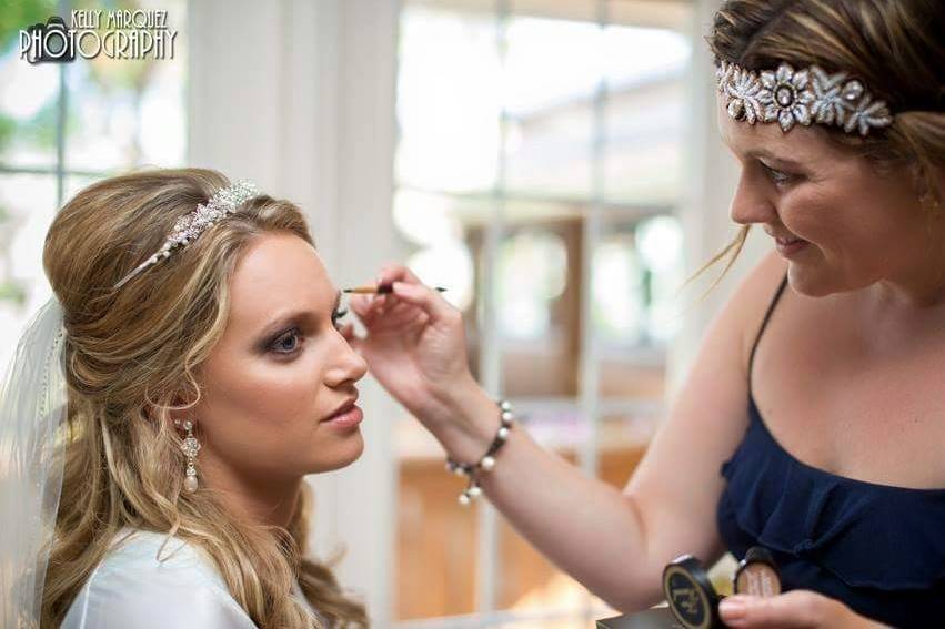 Getting her makeup done