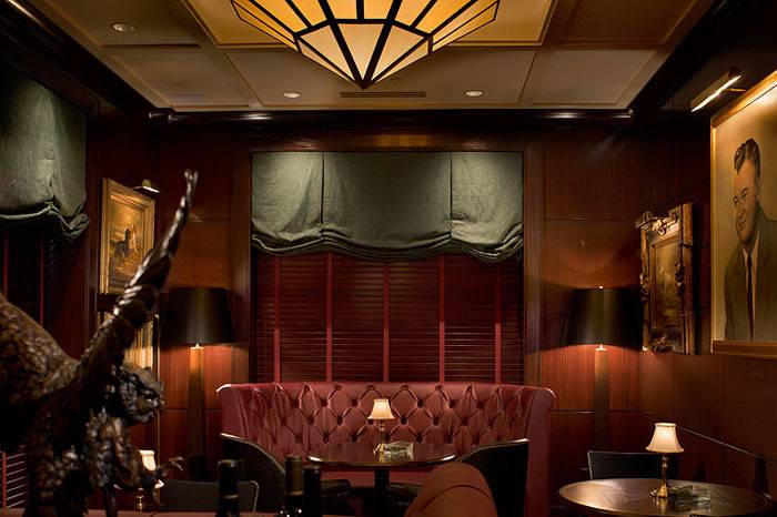 The Semi-Private Lounge Space
A Floor to Ceiling Sound-Dampening Curtain Separates your Party from the Lounge
Accommodates up to 12 Seated at one long table
