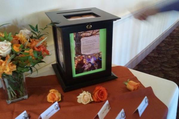 The box for cards, with various roses in front.