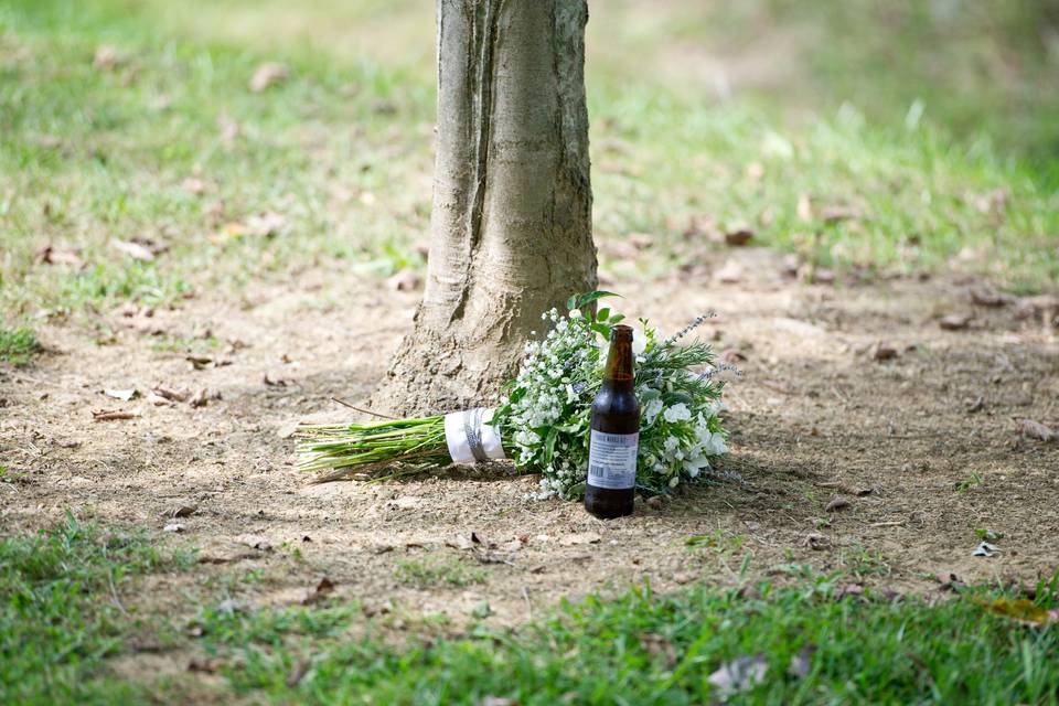 One of the bridesmaids with her herbal bouquet. The wedding took place at the Carroll County Farm Museum in Westminster, MD. Bouquet includes: freesia, chamomile, sage, mint, seeded eucalyptus, and fennel.