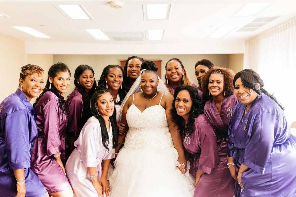 Bride and her bridesmaids in the dressing room