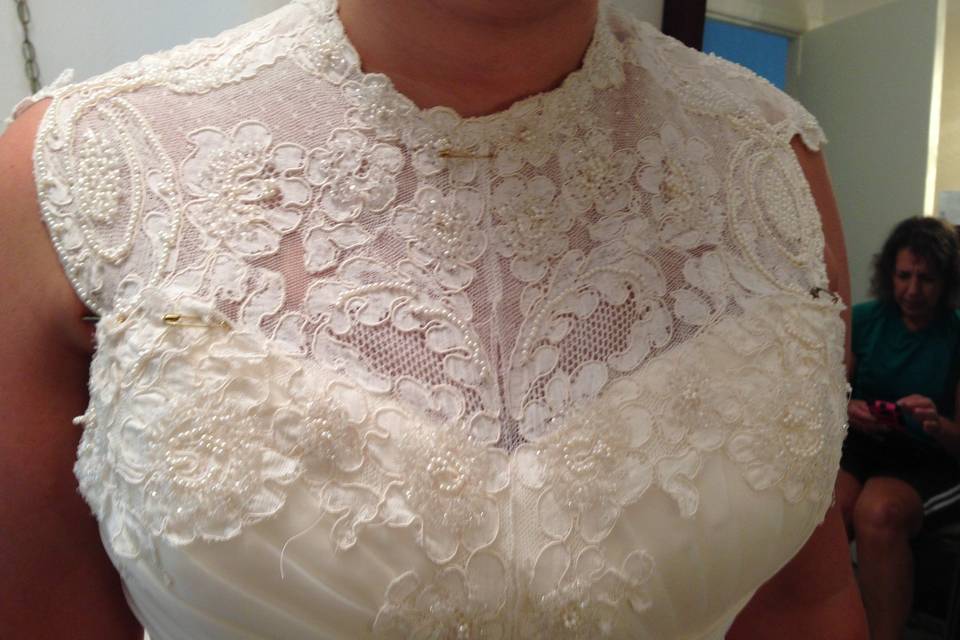 Lace from mothers wedding dress to decorate new one.
