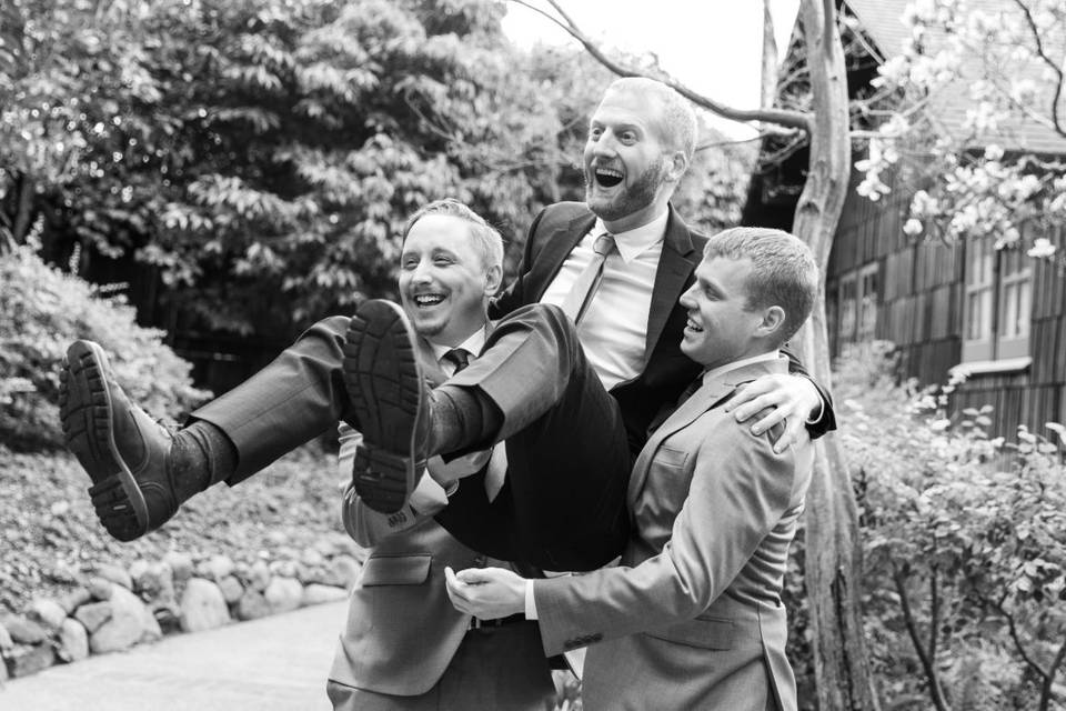 Groom being lifted