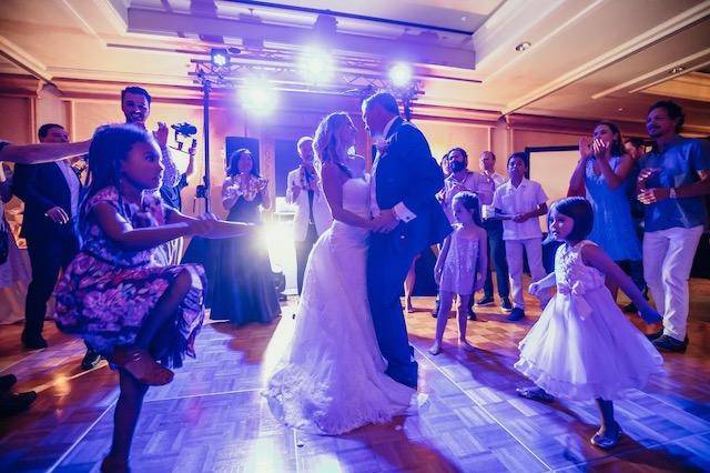 Groom carrying his bride