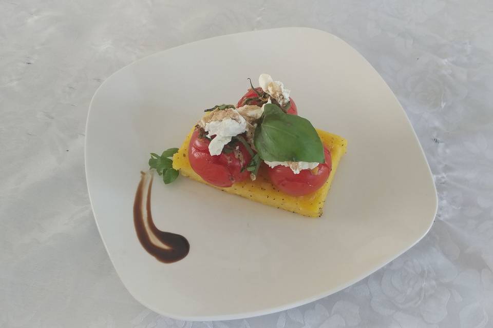 Polenta with roasted tomatoes and goat cheese