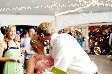 Groom kissing his bride