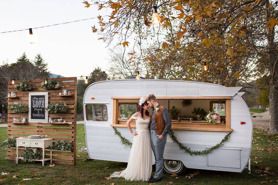 Rustic outdoor wedding reception and lighting