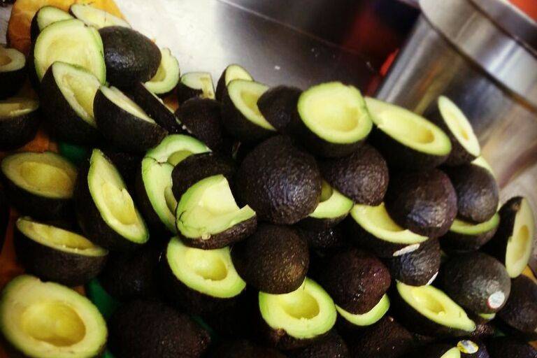 A pile of avocados