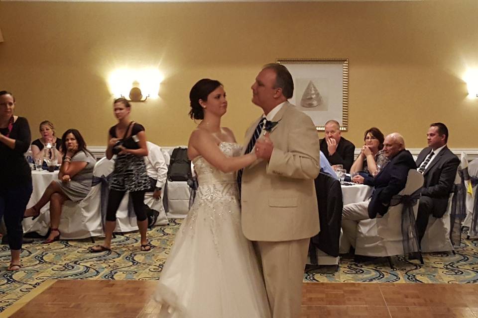 Bride and guest dancing