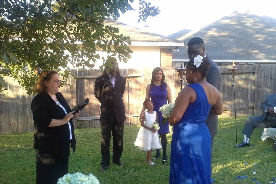 Ceremony was held at the couple's home in Houston, surrounded by family and friends.
