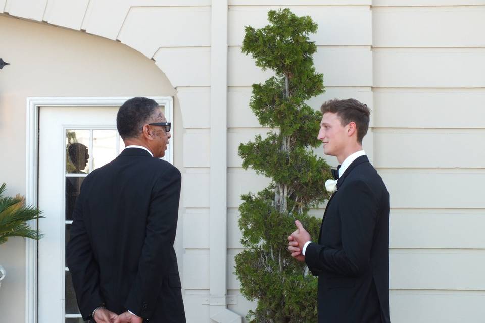 The officiant and the groom